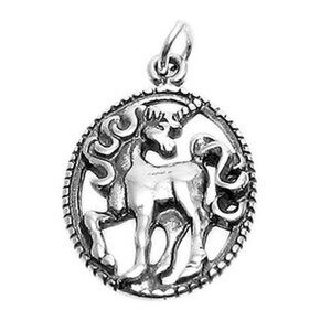 UNICORN IN OVAL FRAME CHARM IN STERLING SILVER.